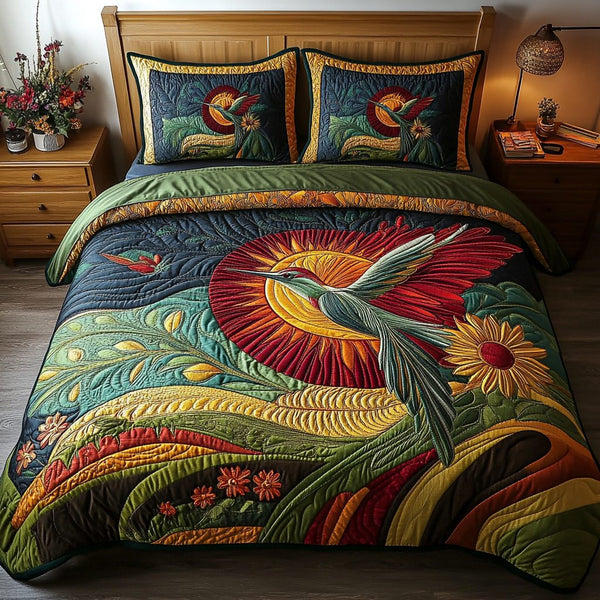 Bloom Seeker quilted 3-piece bedding set on a made bed with two matching pillow shams
