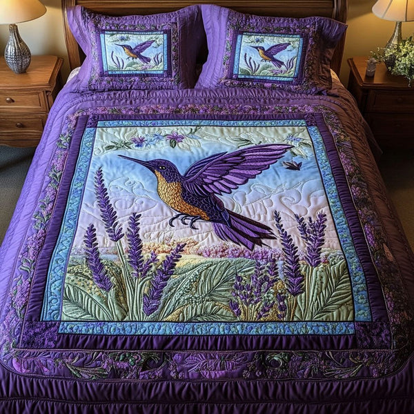 Bloom Seeker quilted 3-piece bedding set on a made bed with two matching pillow shams