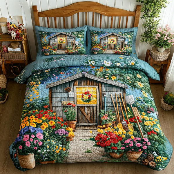 Bloom Shed quilted 3-piece bedding set on a made bed with two matching pillow shams