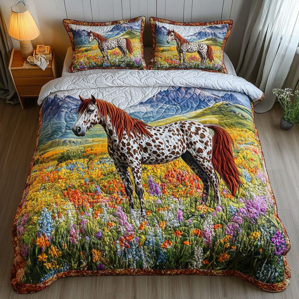 Bloom Valley quilted 3-piece bedding set on a made bed with two matching pillow shams