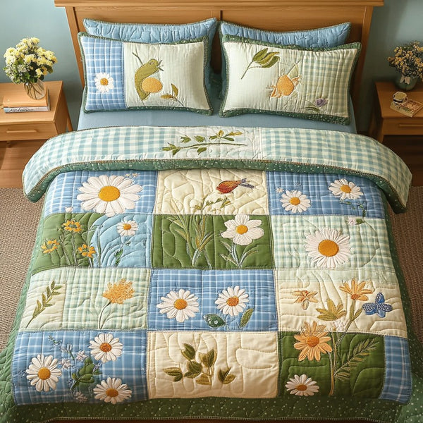 Blooming Beauty quilted 3-piece bedding set on a made bed with two matching pillow shams