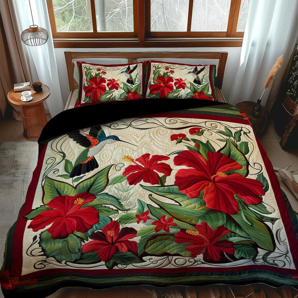 Blooming Beauty quilted 3-piece bedding set on a made bed with two matching pillow shams