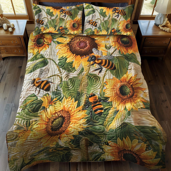 Blooming Bee Paradise quilted 3-piece bedding set on a made bed with two matching pillow shams