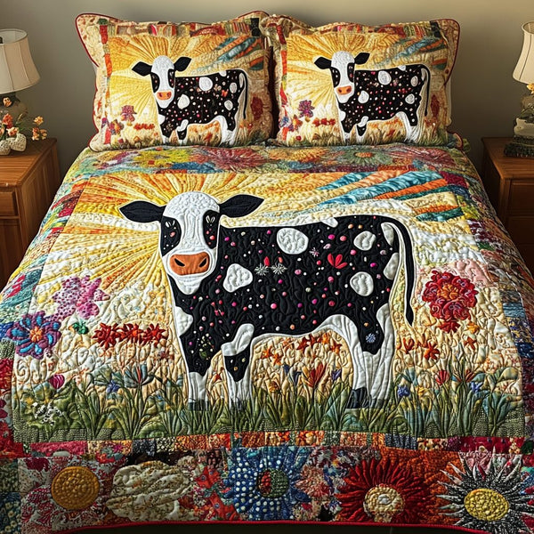 Blooming Belle quilted 3-piece bedding set on a made bed with two matching pillow shams