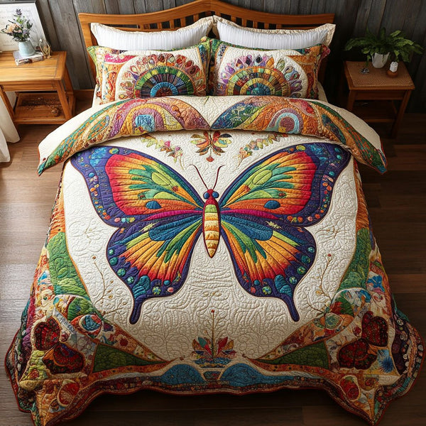 Blooming Breeze quilted 3-piece bedding set on a made bed with two matching pillow shams
