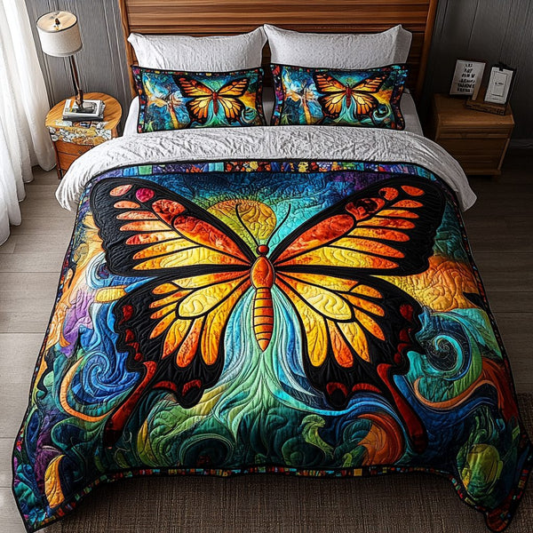 Blooming Butterfly quilted 3-piece bedding set on a made bed with two matching pillow shams