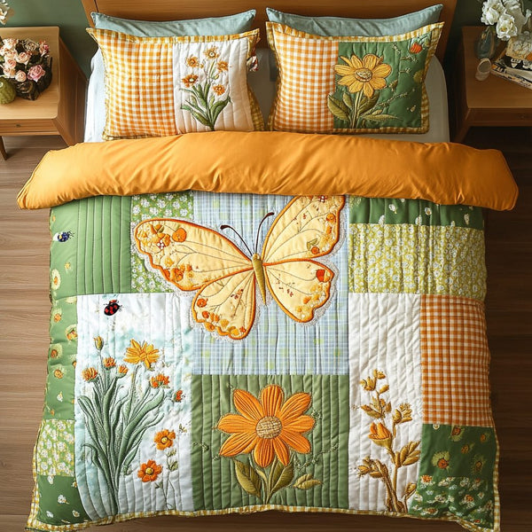 Blooming Butterfly quilted 3-piece bedding set on a made bed with two matching pillow shams