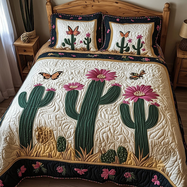 Blooming Cactus quilted 3-piece bedding set on a made bed with two matching pillow shams