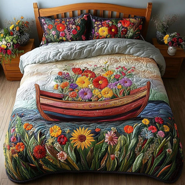Blooming Canoe quilted 3-piece bedding set on a made bed with two matching pillow shams
