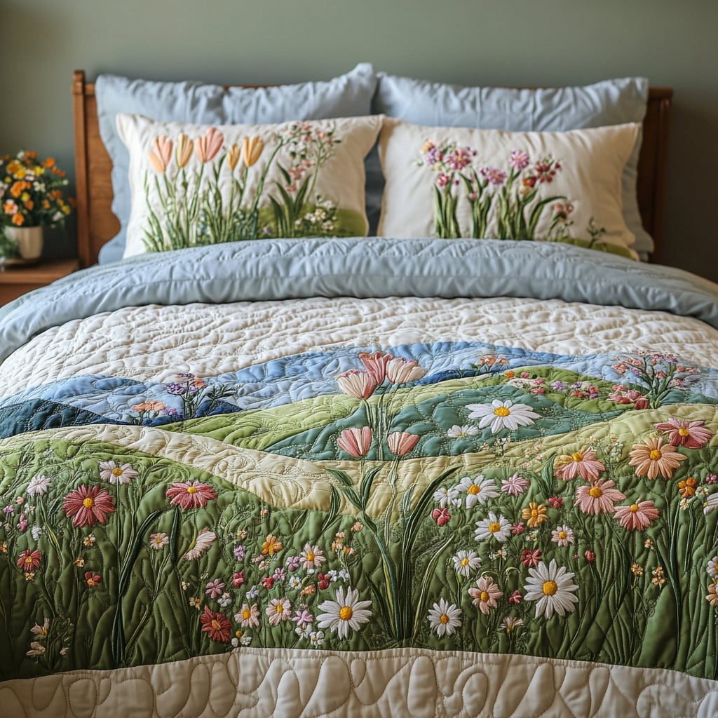 Blooming Fields quilted 3-piece bedding set on a made bed with two matching pillow shams