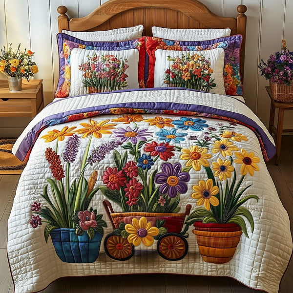 Blooming Garden quilted 3-piece bedding set on a made bed with two matching pillow shams