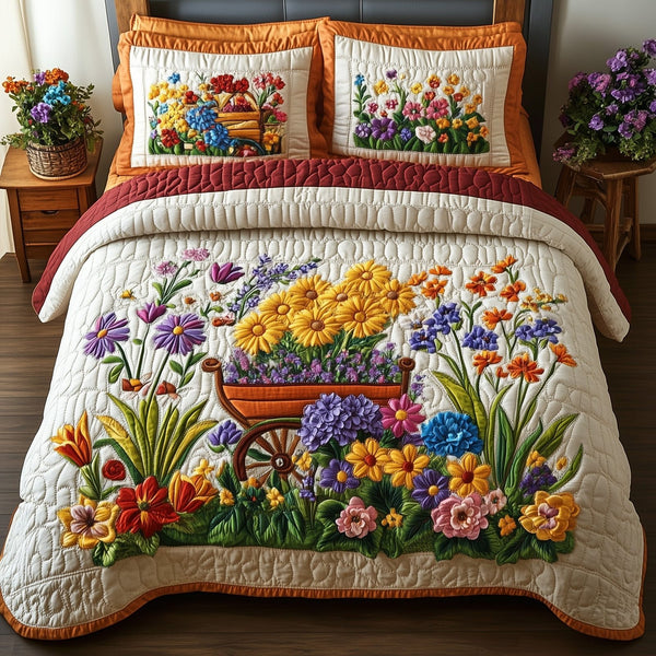 Blooming Garden quilted 3-piece bedding set on a made bed with two matching pillow shams