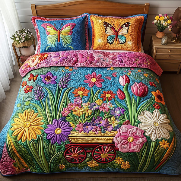 Blooming Garden quilted 3-piece bedding set on a made bed with two matching pillow shams