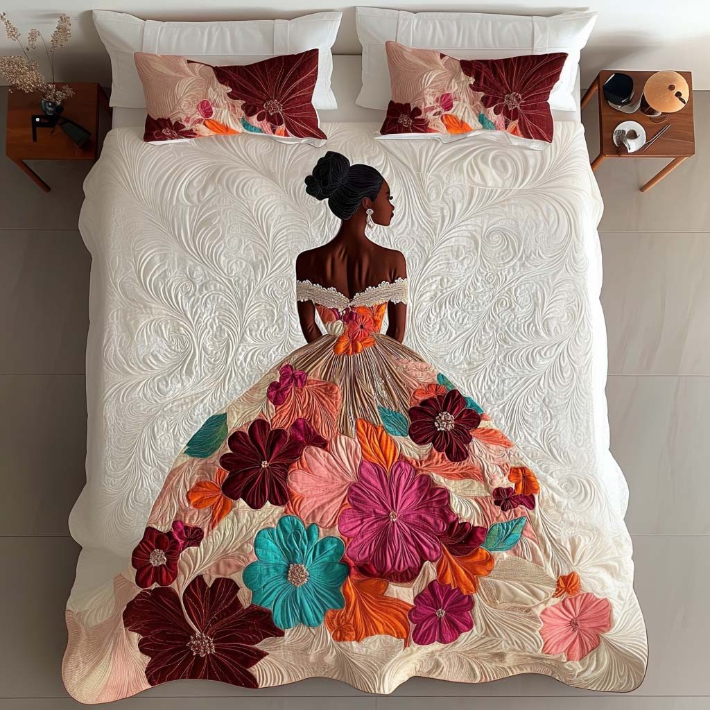 Blooming Grace quilted 3-piece bedding set on a made bed with two matching pillow shams