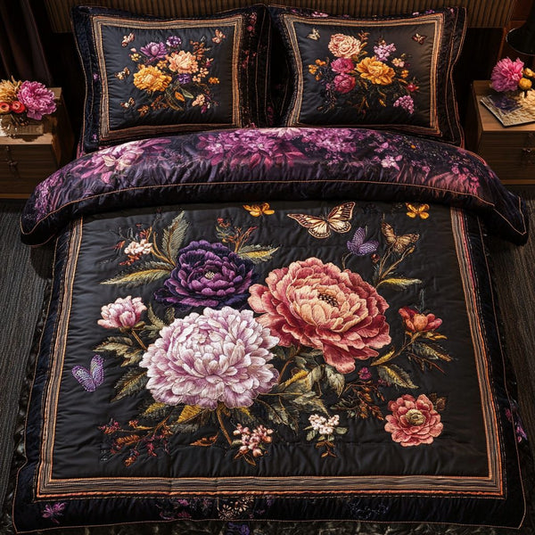 Blooming Grace quilted 3-piece bedding set on a made bed with two matching pillow shams