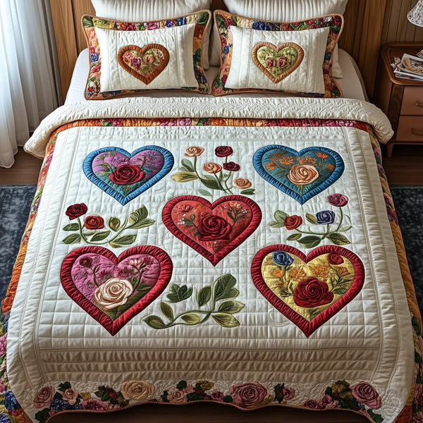 Blooming Heart quilted 3-piece bedding set on a made bed with two matching pillow shams