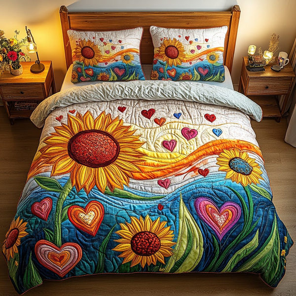 Blooming Hearts quilted 3-piece bedding set on a made bed with two matching pillow shams