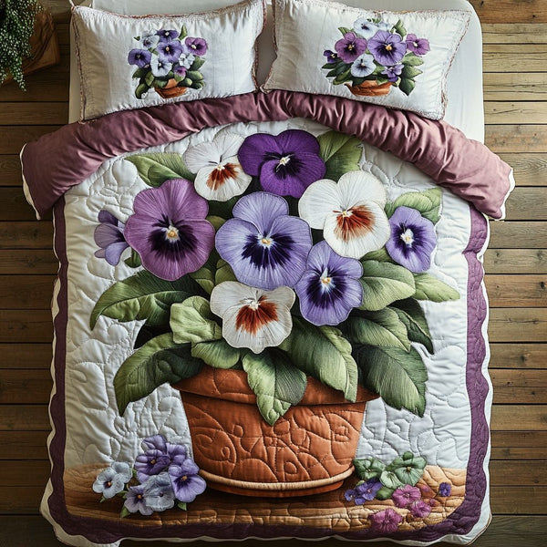 Blooming Joy quilted 3-piece bedding set on a made bed with two matching pillow shams