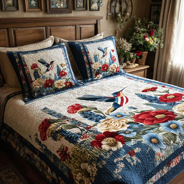Blooming Meadow Song quilted 3-piece bedding set on a made bed with two matching pillow shams