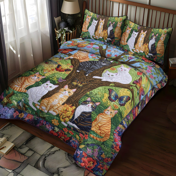 Blooming Purrfection quilted 3-piece bedding set on a made bed with two matching pillow shams