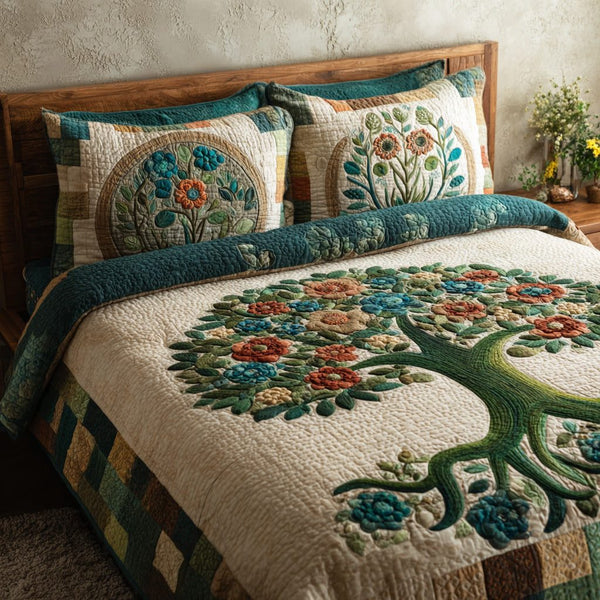 Blooming Roots quilted 3-piece bedding set on a made bed with two matching pillow shams
