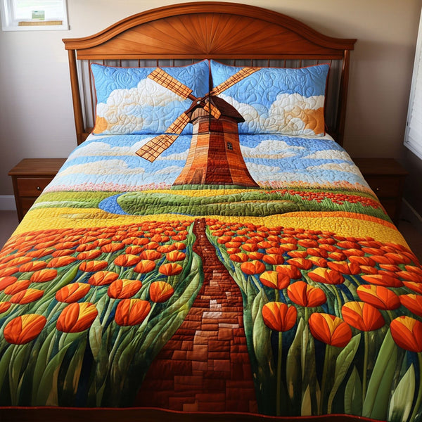 Blooming Windmill quilted 3-piece bedding set on a made bed with two matching pillow shams