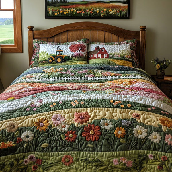 Blossom Acres quilted 3-piece bedding set on a made bed with two matching pillow shams