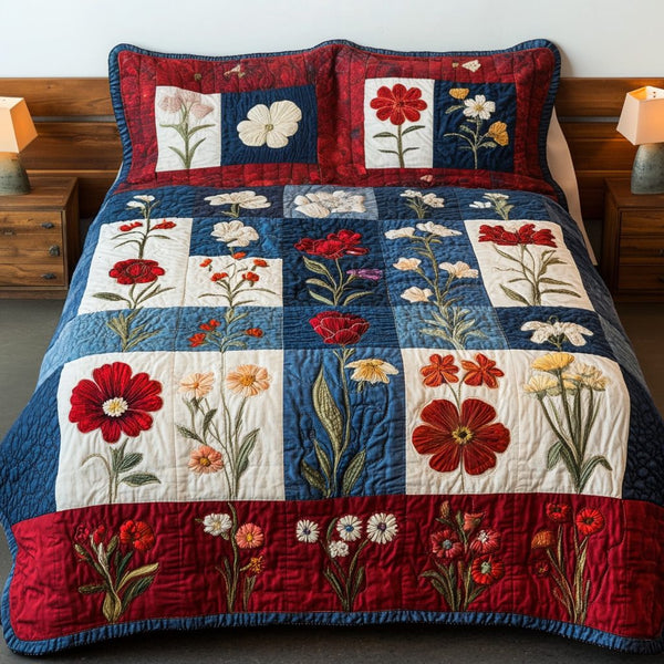 Blossom Beauty quilted 3-piece bedding set on a made bed with two matching pillow shams