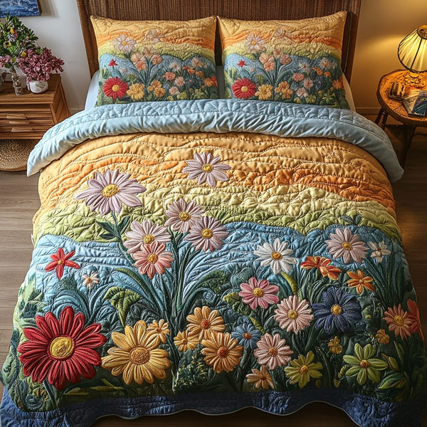 Blossom Bliss quilted 3-piece bedding set on a made bed with two matching pillow shams