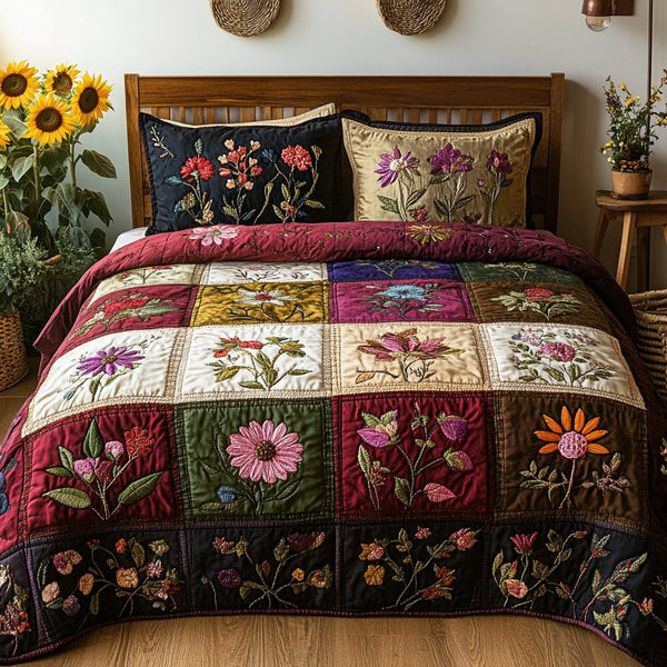 Blossom Bouquet quilted 3-piece bedding set on a made bed with two matching pillow shams