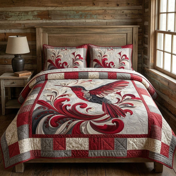 Blossom Breeze quilted 3-piece bedding set on a made bed with two matching pillow shams