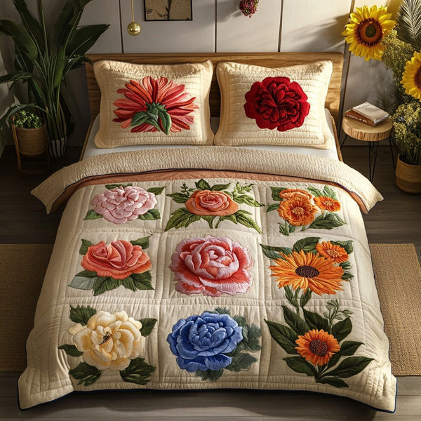 Blossom Breeze quilted 3-piece bedding set on a made bed with two matching pillow shams