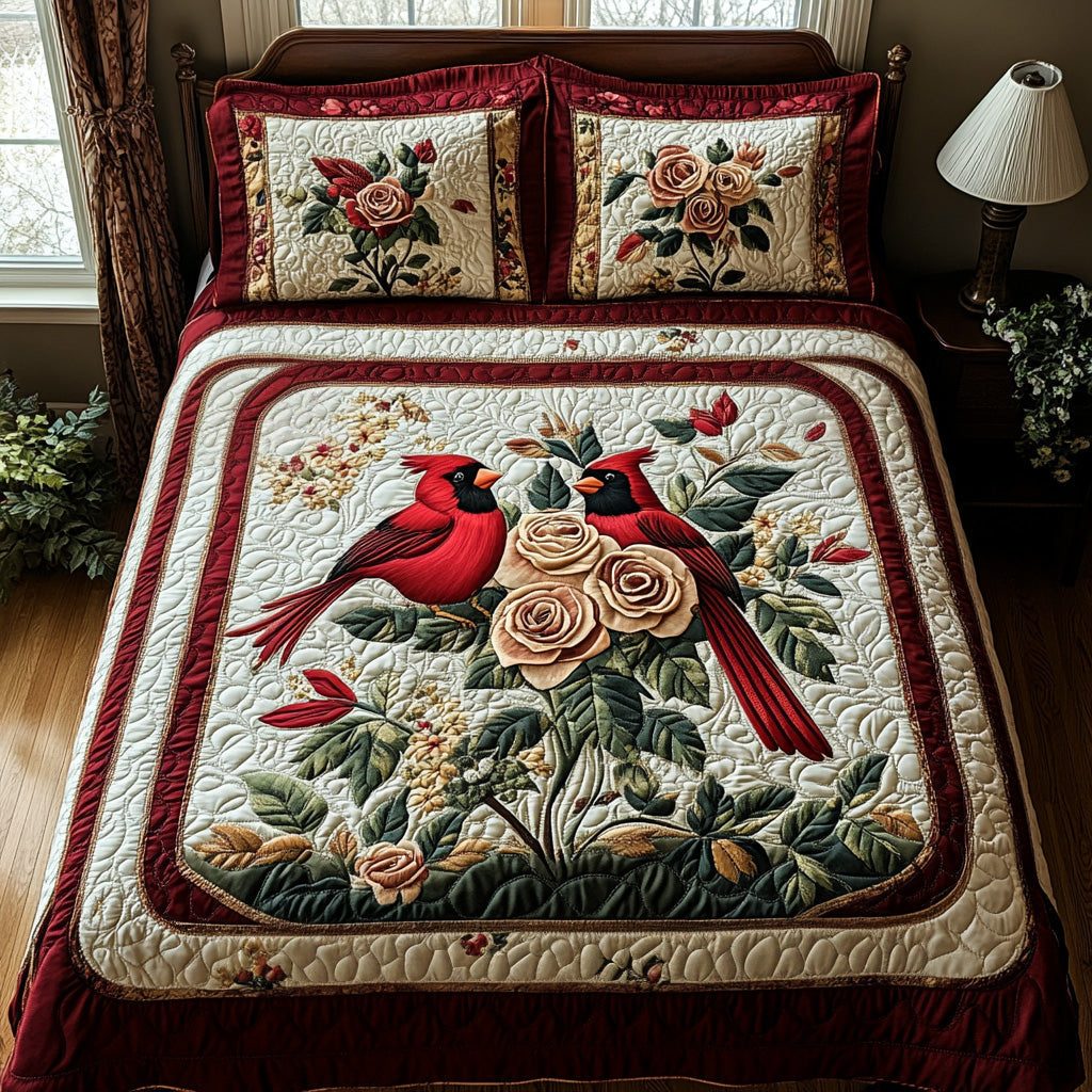 Blossom Cardinal quilted 3-piece bedding set on a made bed with two matching pillow shams