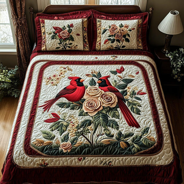 Blossom Cardinal quilted 3-piece bedding set on a made bed with two matching pillow shams