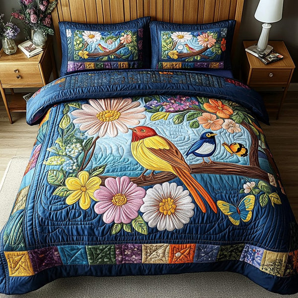 Blossom Dream quilted 3-piece bedding set on a made bed with two matching pillow shams
