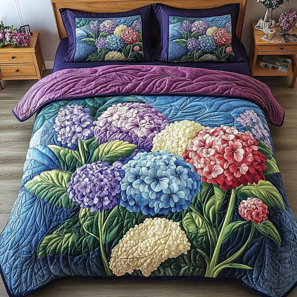 Blossom Haven quilted 3-piece bedding set on a made bed with two matching pillow shams