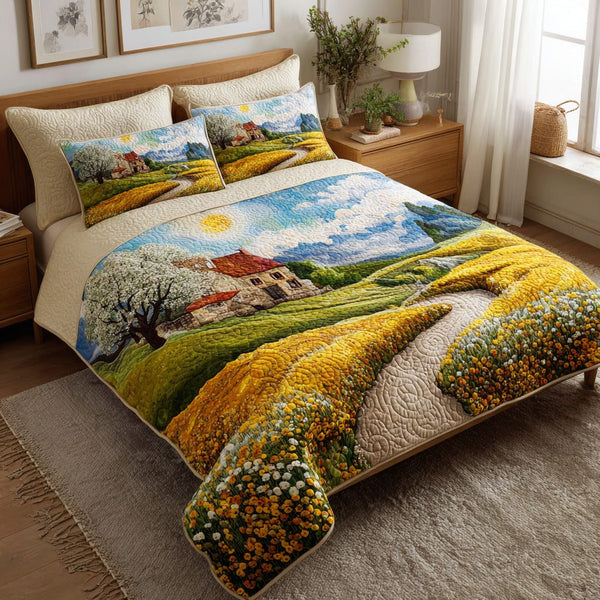 Blossom Lane quilted 3-piece bedding set on a made bed with two matching pillow shams