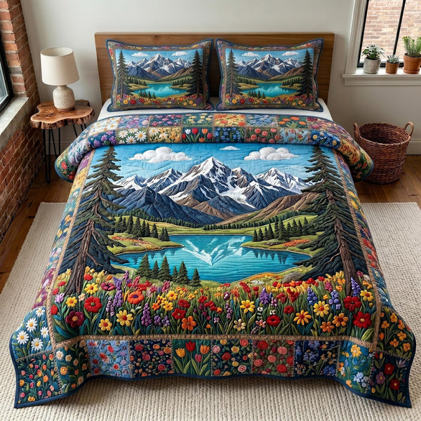 Blossom Meadow quilted 3-piece bedding set on a made bed with two matching pillow shams