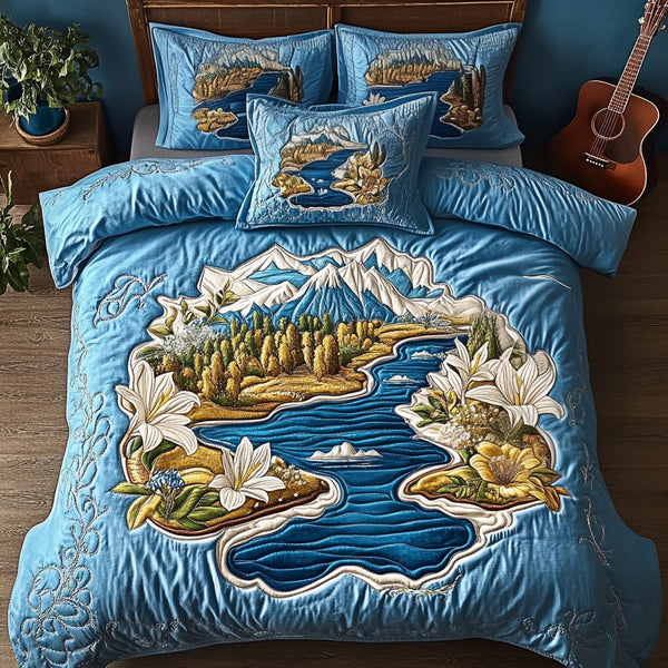 Blossom Mountain quilted 3-piece bedding set on a made bed with two matching pillow shams