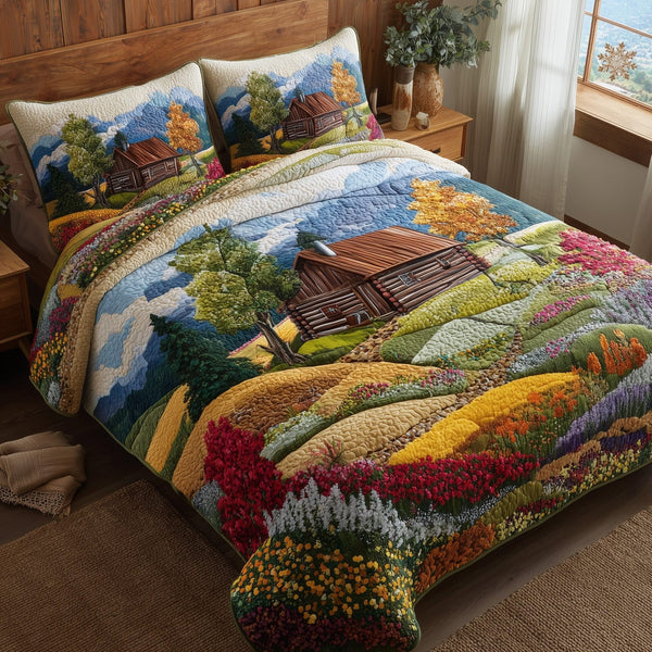 Blossom Pasture quilted 3-piece bedding set on a made bed with two matching pillow shams