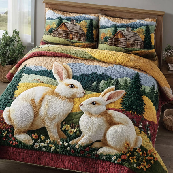 Blossom Pasture quilted 3-piece bedding set on a made bed with two matching pillow shams