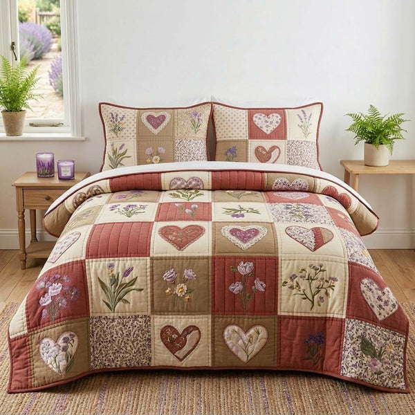 Blossom Patchwork quilted 3-piece bedding set on a made bed in a farmhouse bedroom