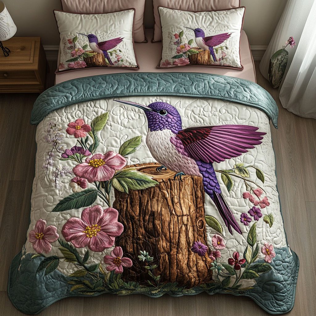 Blossom Perch quilted 3-piece bedding set on a made bed with two matching pillow shams