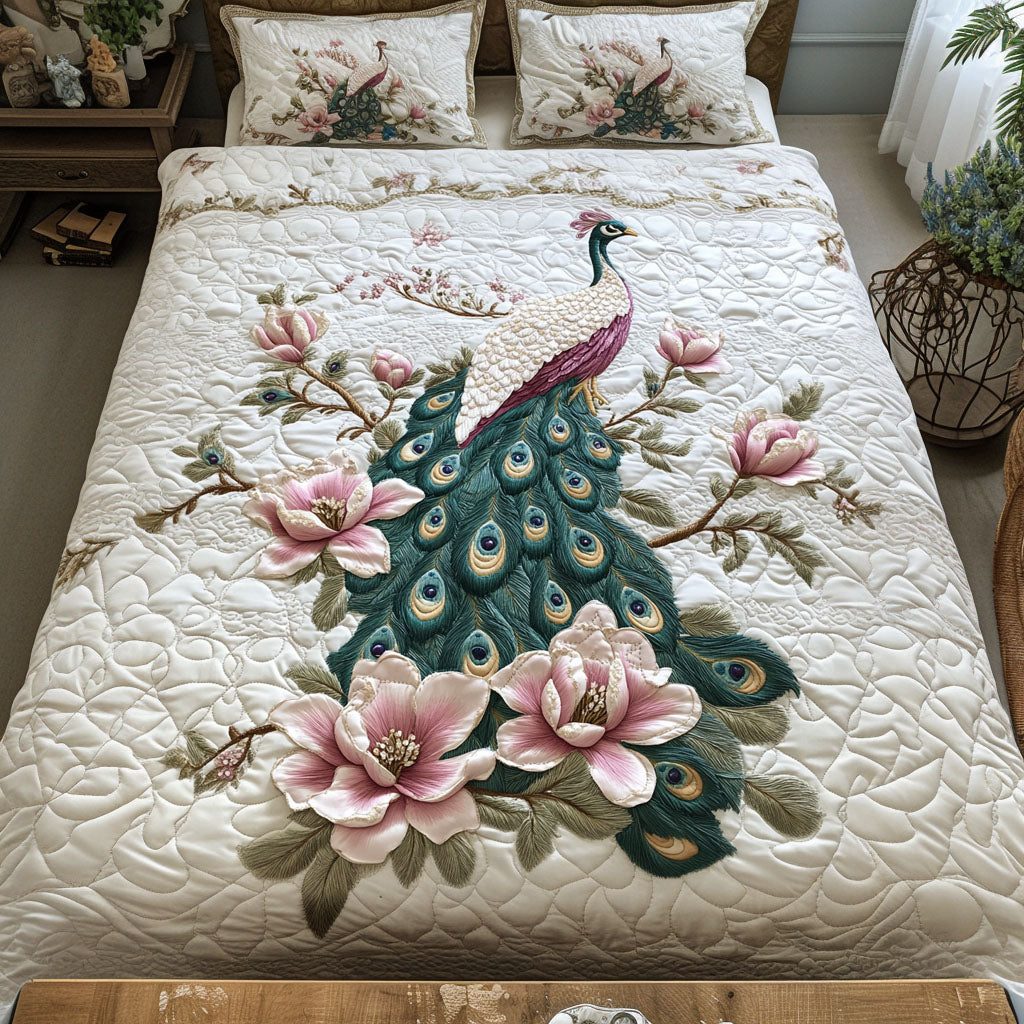 Blossom Royale quilted 3-piece bedding set on a made bed with two matching pillow shams