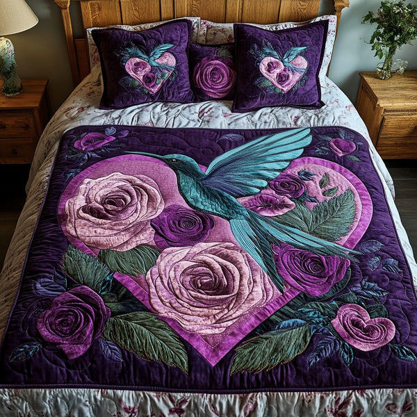 Blossom Soar quilted 3-piece bedding set on a made bed with two matching pillow shams