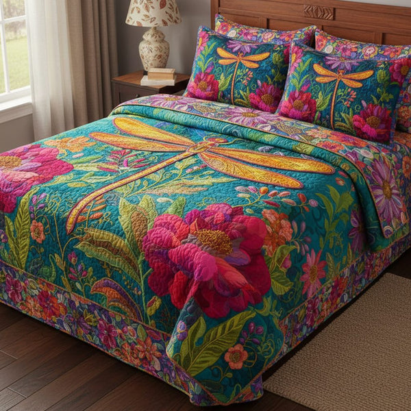 Blossom Symphony Dragonfly quilted 3-piece bedding set on a made bed with two matching pillow shams