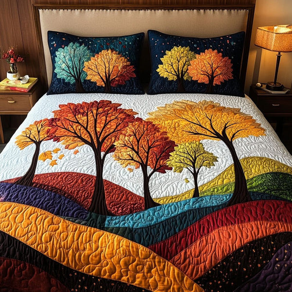 Blossoms of the Fall Wind quilted 3-piece bedding set on a made bed with two matching pillow shams