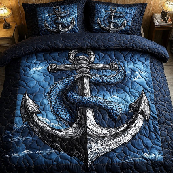 Blue Anchor quilted 3-piece bedding set on a made bed in a light coastal bedroom