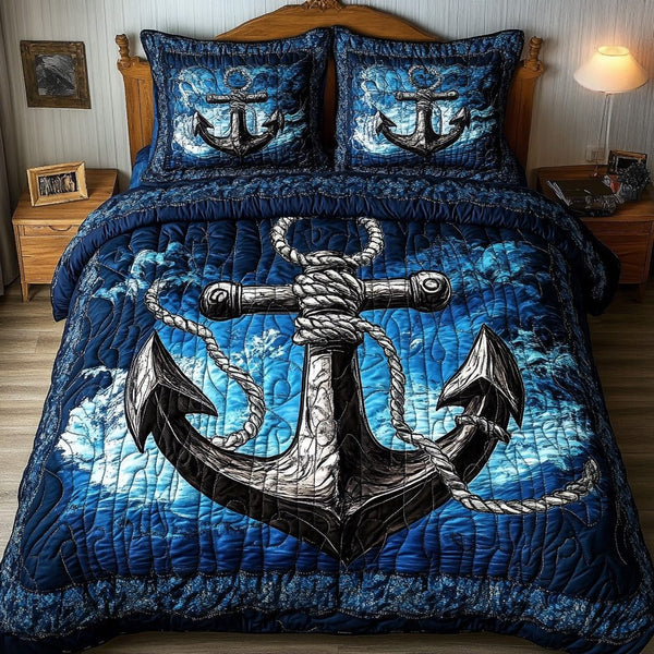 Blue Anchor quilted 3-piece bedding set on a made bed in a light coastal bedroom