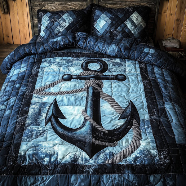 Blue Anchor quilted 3-piece bedding set on a made bed in a light coastal bedroom